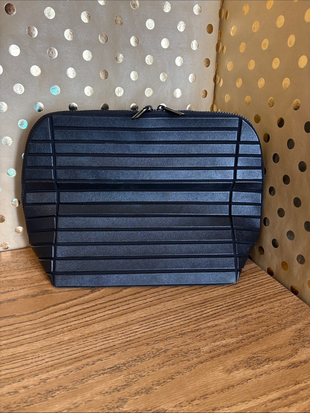 Sleek black Parallelle Cosmetic Pouch
